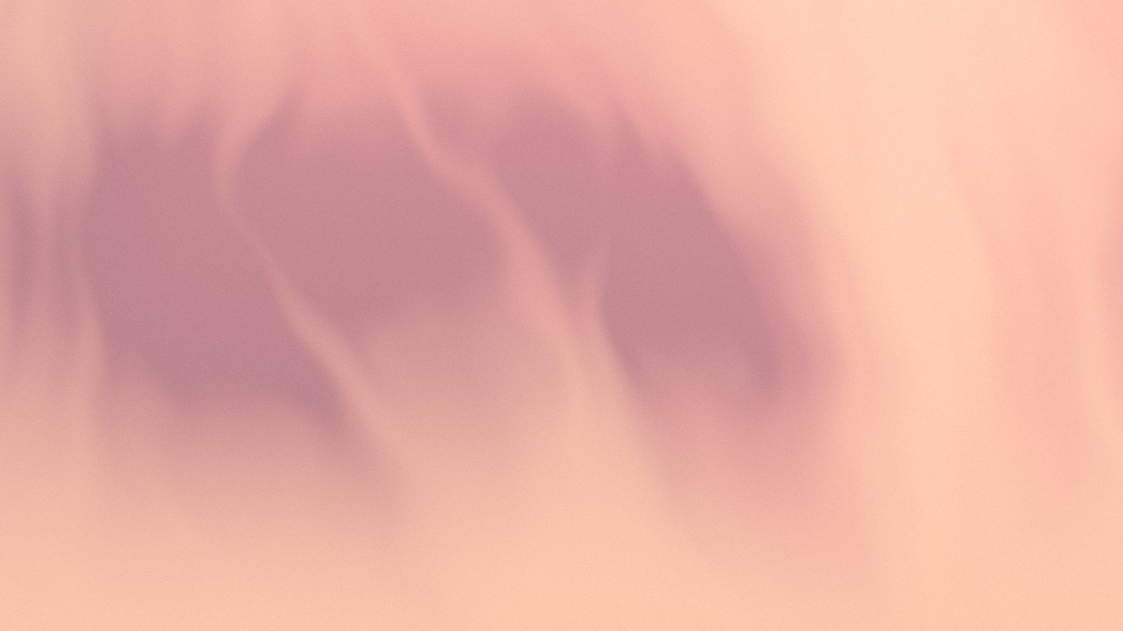Peach and lilac aurora gradient MacBook wallpaper